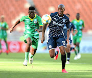 S'fiso Hlanti of  Wits, right, is challenged by Richard Mbulu of Baroka in a previous PSL match. / Kabelo Leputu/BackpagePix