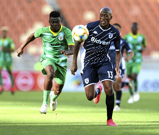 S'fiso Hlanti of Wits, right, is challenged by Richard Mbulu of Baroka in a previous PSL match. / Kabelo Leputu/BackpagePix