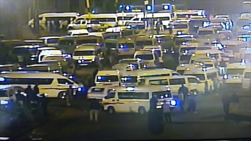 Taxis blockade the area around the Toyota factory, at Prospecton, south of Durban, as they protest over Quantum price increases.