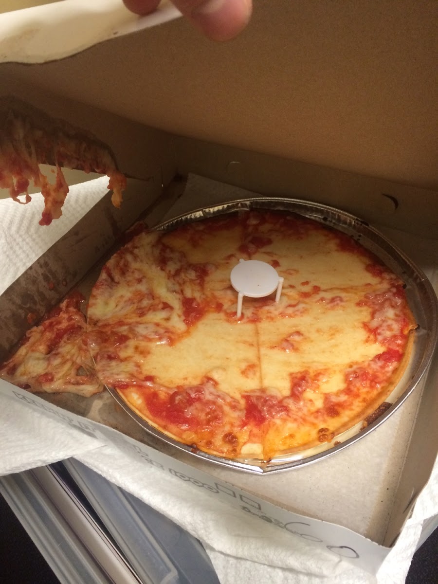 Is it that cheese doesn't stay on gluten free pizza? Or that your delivery guy dropped my pizza and still took my money? Lol We may never know... If your gluten free, don't waste your time or money here. Your cheese will fall off.