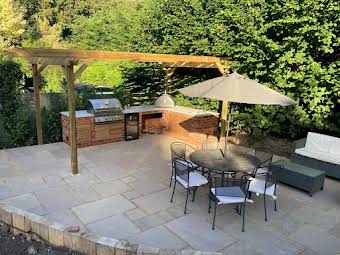 Raj Blend Indian sandstone, raised sleepers, pergola and BBQ area album cover