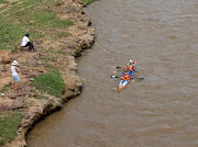 Canoeists paddle towards Durban on day one.