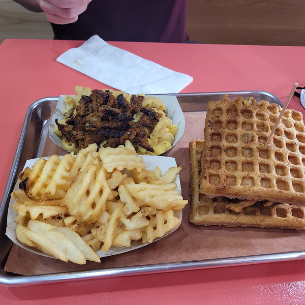 Mac, fries, and impossible burger on waffle