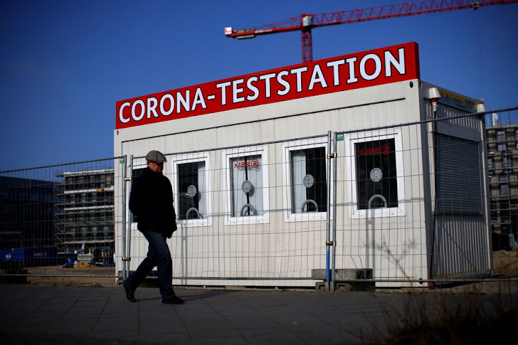 A person walks past a closed coronavirus disease (COVID-19) testing station, in Berlin, Germany, March 18, 2022