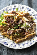 Penne with tomatoes, spicy sausage and cream.