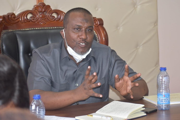 Wajir county secretary Abdullahi Maalim speaks to a team from the National Gender and Equality Commission in conjunction with Humanity & Inclusion-a non governmental organisation when they paid him a courtesy call on Wednesday, December 22.