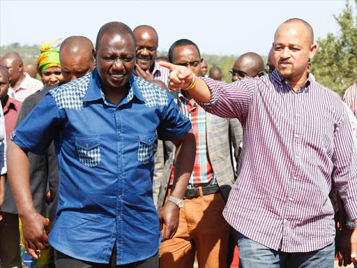 COSTLY TIES: DP William Ruto and Lunga Lunga MP Khatib Mwashetani at Juakali Primary School in the constituency on June 14 last year.