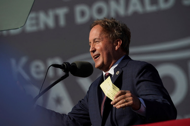 Texas attorney-general Ken Paxton speaks ahead of a rally held by former US president Donald Trump, in Robstown, Texas, the US, October 22 2022. Picture: GO NAKAMURA/REUTERS