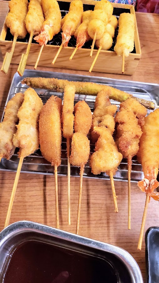 Eats in Oahu - Waikiki Yokocho offers 15 options in the basement food court including 4 ramen spots, an onigiri kiosk, a matcha green tea drink and dessert cafe, a tempura specialty restaurant, a kushikatsu restaurant, and a bbq/hotpot restaurant, and more