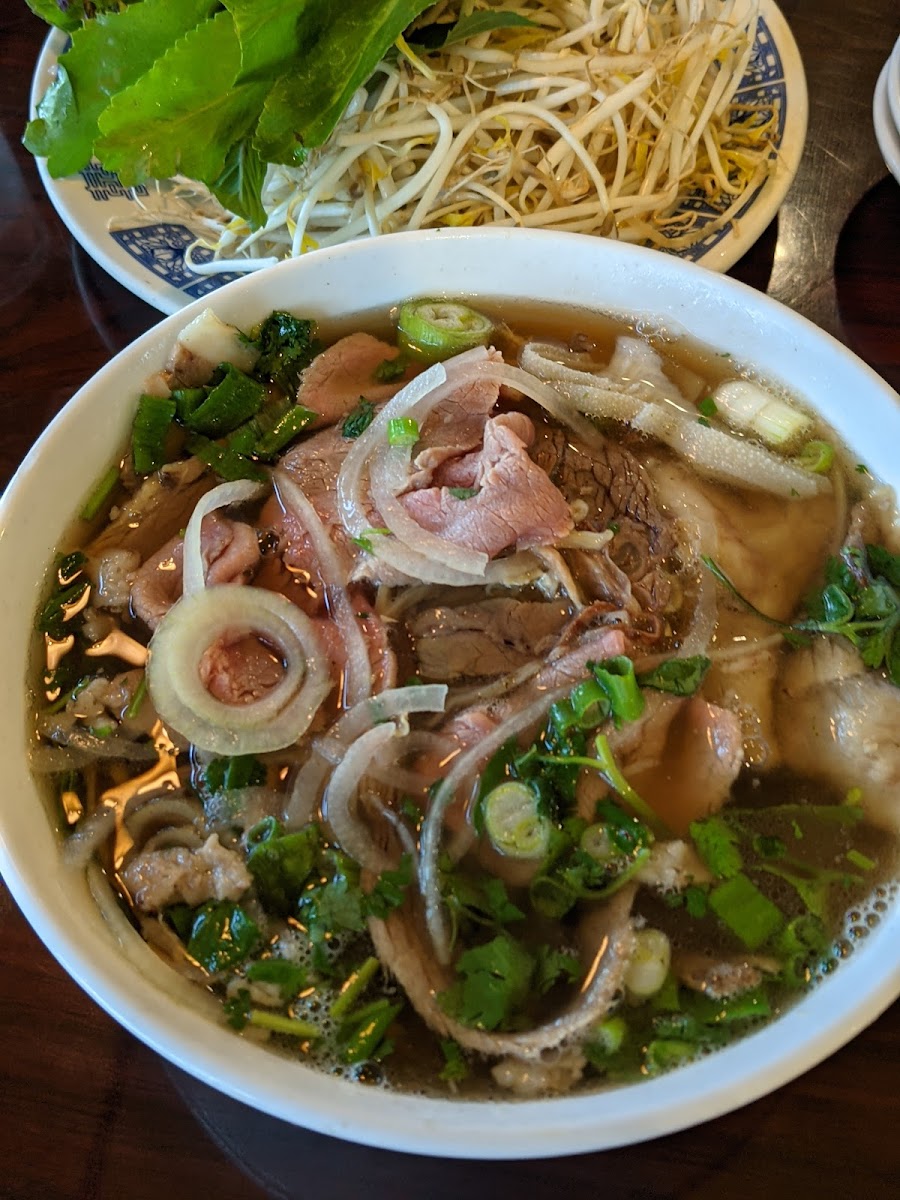 beef pho with rare steak, flank, brisket, tendon and tripe