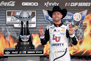 William Byron celebrates in victory lane after winning the NASCAR Cup Series Autotrader EchoPark Automotive 400 at Texas Motor Speedway on September 24 2023 in Fort Worth, Texas.