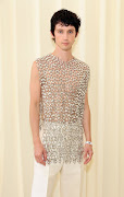 Troye Sivan leaves it bare in Valentino Haute Couture. 