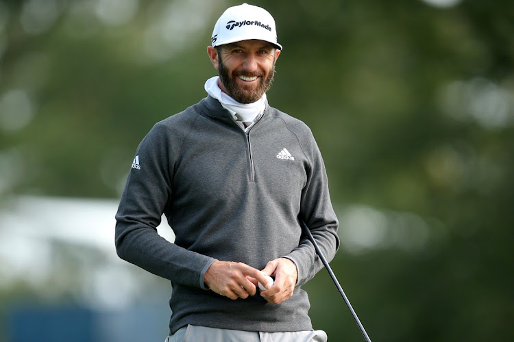 Dustin Johnson smiles on the 11th green during a practice round for the 2020 US Open at Winged Foot Golf Club in Mamaroneck, New York, on September 15, 2020