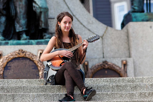 A busker, or street performer, at War Memorial in downtown St. John's, Newfoundland. 