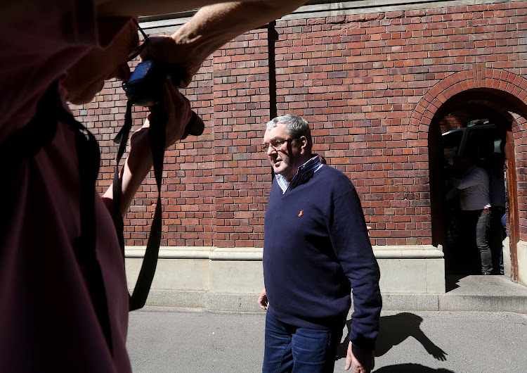 Dutch fugitive Augustinus Petrus Kouwenhoven, convicted of crimes against humanity and selling firearms to former Liberian president Charles Taylor, leaves the Cape Town magistrate's court after paying bail of R1m.