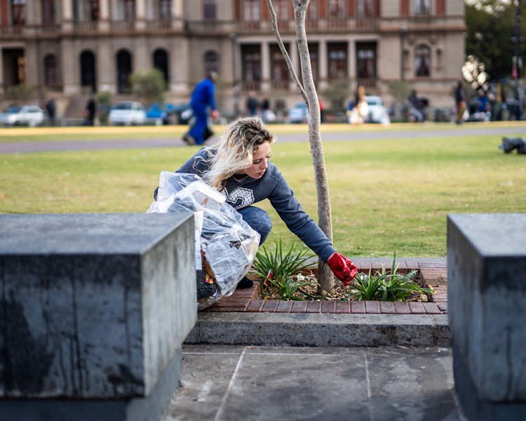 Volunteers with Christian group Dare To Love helped clean up the CBD.