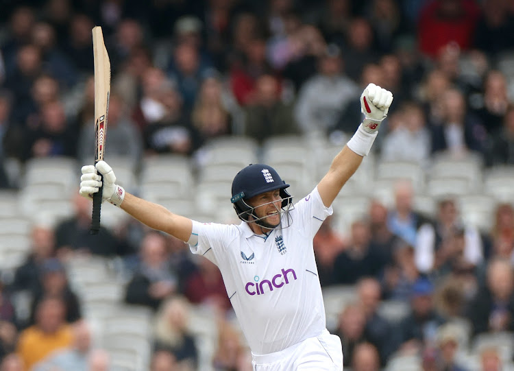 England's Joe Root celebrates winning the match