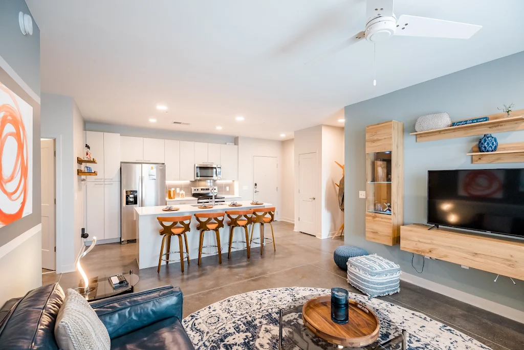 Open concept living space with kitchen island and a lounge area