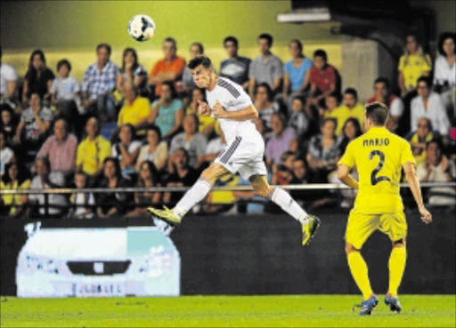 IMPRESSIVE: Gareth Bale, left, of Real Madrid in action against Mario Gaspar of Villarreal Photo: Getty Images