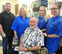 Stella's Barber Shop logo