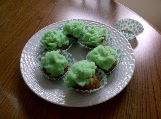 Cupcakes??? Nope! Mini Meatloaves frosted with mashed potatoes with a little green food coloring. 