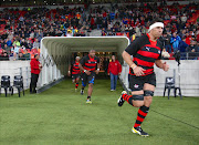 Darron Nell (C) of EP Kings leads the EP Kings out onto the pitch during the Incoming Tour match between EP Kings and Wales at Nelson Mandela Bay Stadium on June 10, 2014 in Port Elizabeth, South Africa.