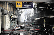 A fire destroyed the arrivals hall and immigration unit at East Africa's busiest airport, Jomo Kenyatta International, in Nairobi early yesterday, grounding flights and leaving thousands of passengers stranded. South African Airways cancelled both of its scheduled flights to Nairobi yesterday, the national carrier said. Kenya Airways said its first overseas flights to land at the airport would arrive as scheduled early today. Domestic and cargo flights resumed later yesterday. Investigators have not yet established the cause of the blaze.