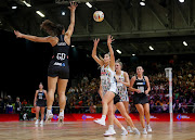 Phoenix Karaka of New Zealand and Nichole Taljaard of South Africa during their 2023 Netball World Cup pool G match at Cape Town International Convention Centre on August 2 2023 .