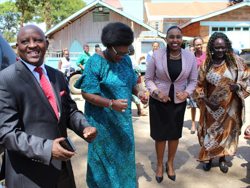 Nyeri Governor Mutahi Kahiga, Youth CAS Rachel Shebesh and Nyeri Deputy Governor Caroline Karugu join women in a jig in Nyeri on Monday / EUTYCAS MUCHIRI