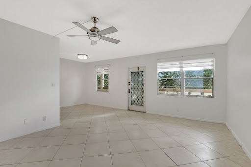 Bright living room with ceiling fan - Luxury apartment for sale in Deerfield Beach, 2 bedrooms