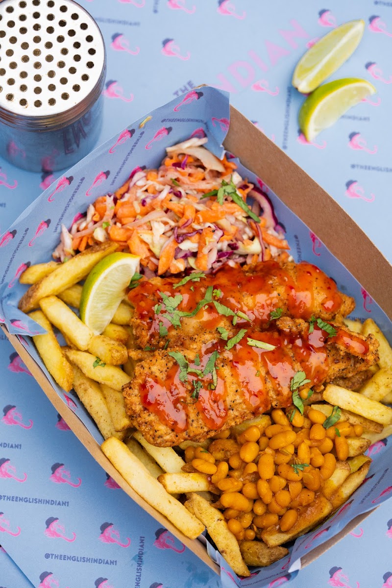 Delicious Twisted KFC - Indian Style Fried Chicken & Chips accompanied by our Chaat Masala Chips, Homemade Curried Baked Beans, Jaipur Coleslaw, Sweet Chilli Sauce, fresh Lime & Coriander.
Delicious and Gluten Free!