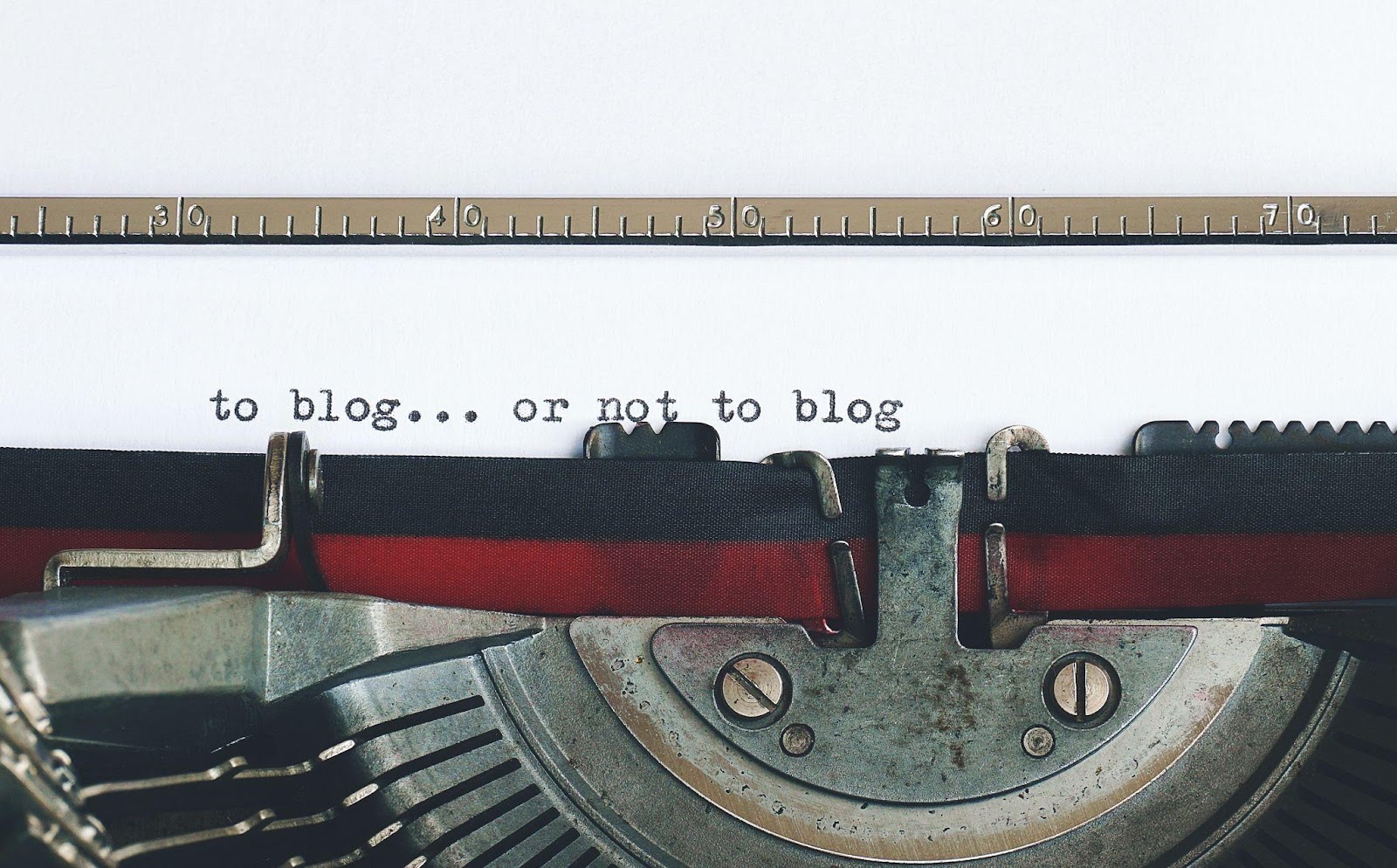 a typewriter that has typed "to blog... or not to blog" as we tackle the importance of blogs of animation businesses