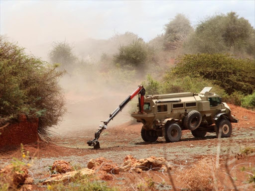 An AMISOM IED detonating truck seen defusing an IED planted by Al-Shabaab in Awdinle targeting Somalia forces. /FILE