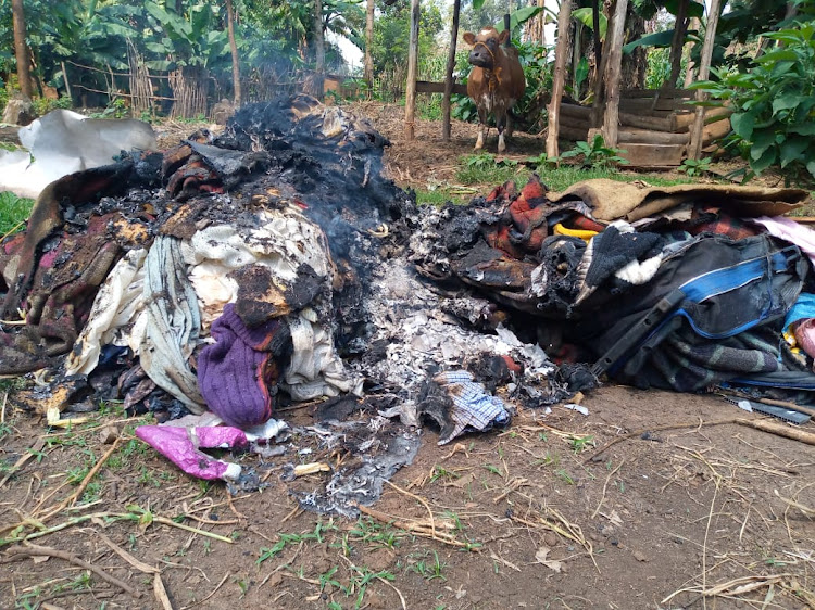 Property destroyed by the fire displayed outside the house.