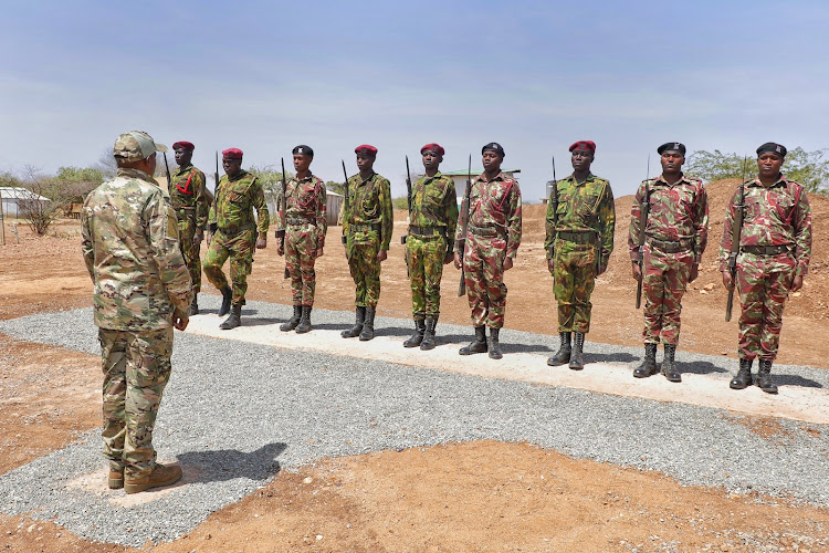 Interior CS Kindiki Kithure with officers during his tour of Lokichogio and Nadapal to access the security situation on January 27,2023.