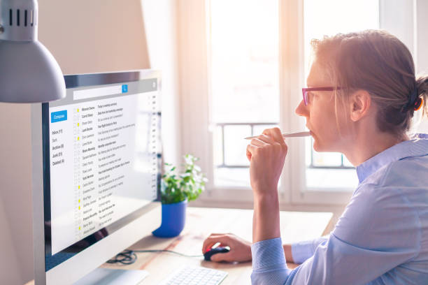 a woman checking email on computer