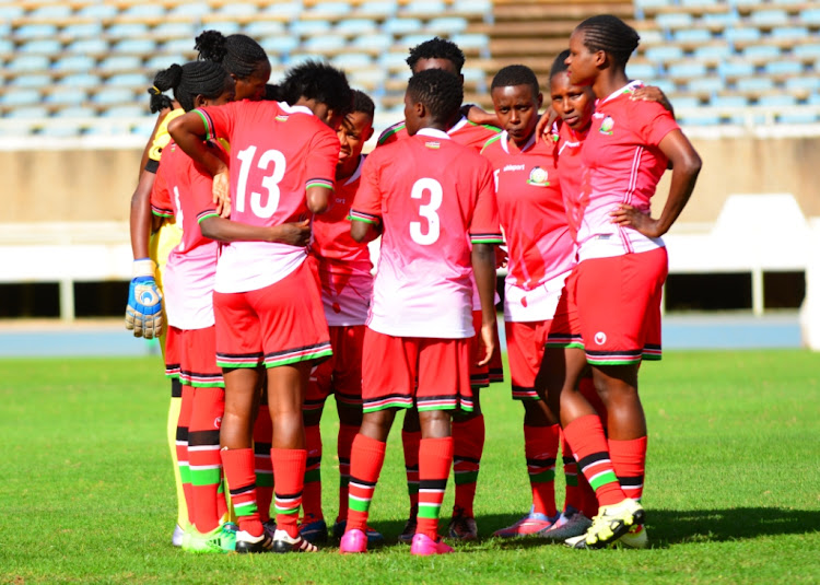 Harambee starlets players converse during their Olympic qualifiers clashagainst Ghana Black queens at Moi stadium,Kasarani on October 8,2019.