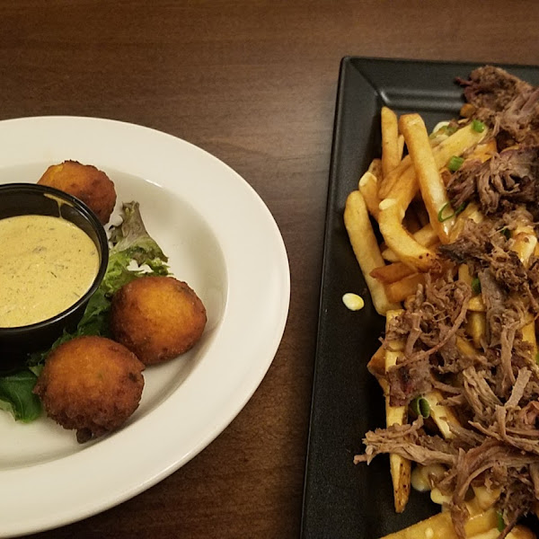 Hush puppies and cheese fries with brisket