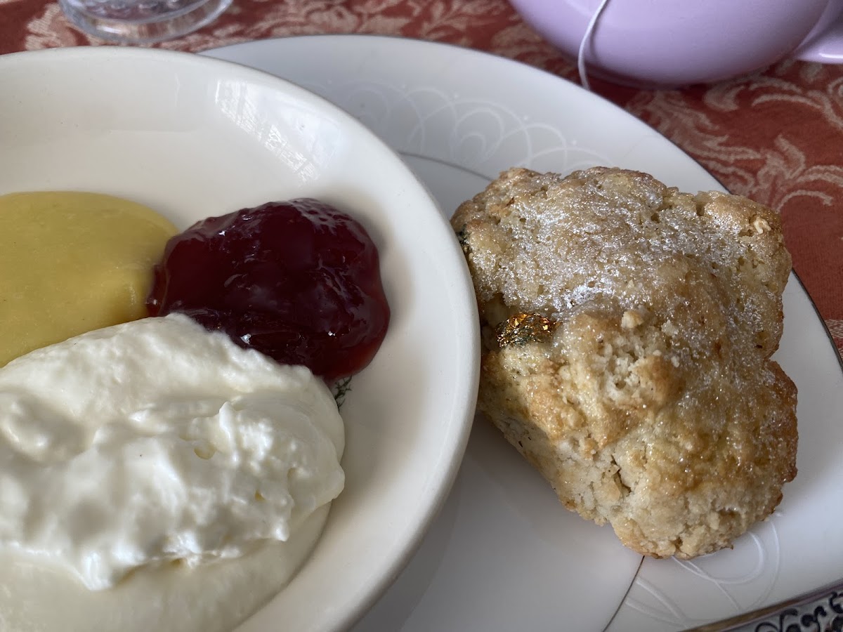 Gluten free scones with edible gold leaf to differentiate as gluten free