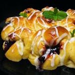 Pull-Apart Easter Blossom Bread was pinched from <a href="http://allrecipes.com/Recipe/Pull-Apart-Easter-Blossom-Bread/Detail.aspx" target="_blank">allrecipes.com.</a>