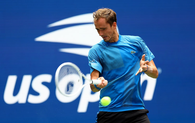 Danill Medvedev of Russia plays a forehand against Stefan Kozlov of the US in their first round match at the 2022 US Open