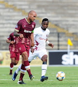 Robyn Johannes of Stellenbosch FC is challenged by Kagiso Malinga of Swallows FC during the DStv Premiership match between Stellenbosch FC and Swallows at Danie Craven Stadium on October 25, 2020 in Stellenbosch, South Africa. (Photo by Ryan Wilkisky/Gallo Images)