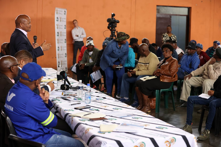 Minister of water and sanitation Senzo Mchunu addresses residents on the water crisis in Mabopane.