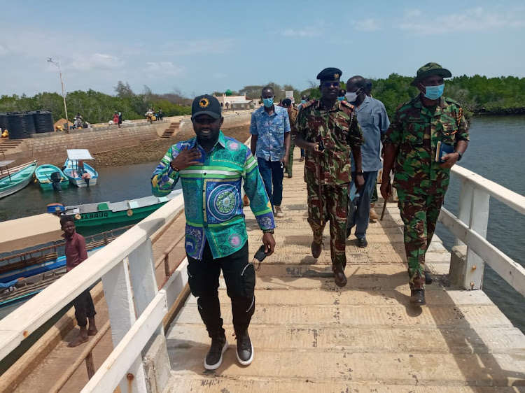 Coast regional coordinator John Elungata and other security officers after a security meeting in the region. He is with Lamu senator Anwar Loitiptip and other county leaders.