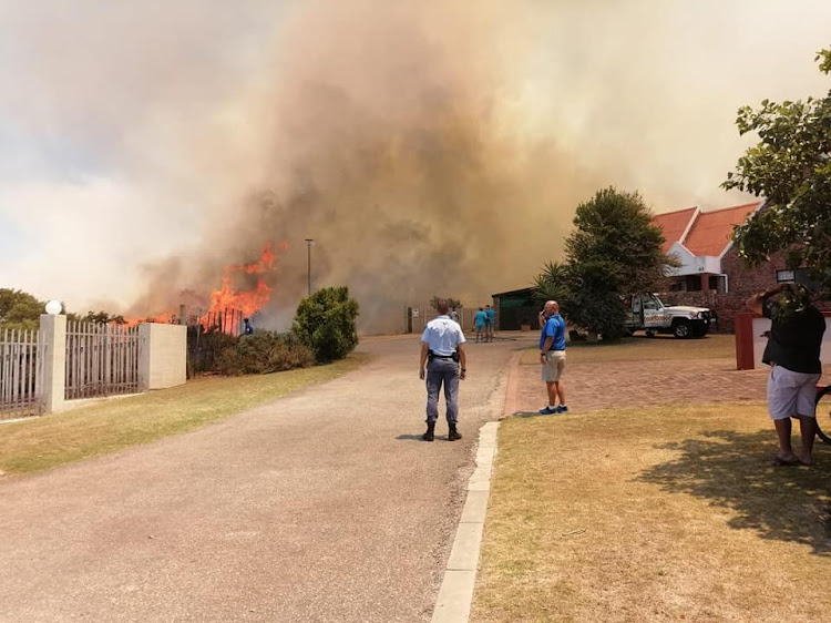 A wildfire in Mossel Bay had been contained by Monday afternoon, but not before at least two homes were destroyed.