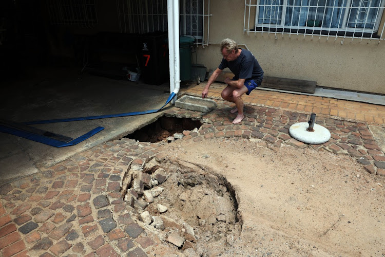 Anton de Montille at his home with sinkholes in Germiston , Ekurhuleni .