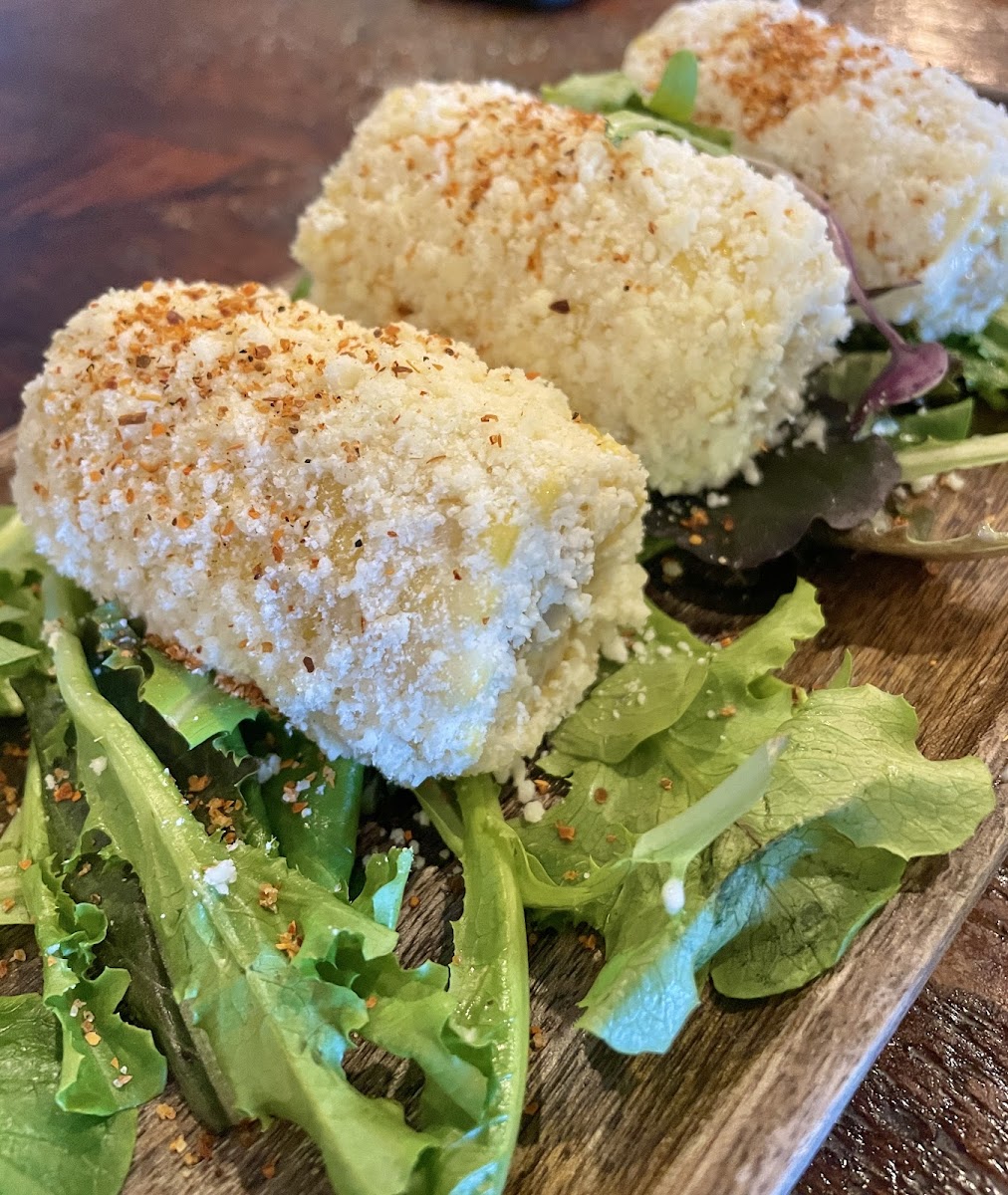 STREET CORN

Corn on the cob with tangy creamy sauce, sprinkled with cotija cheese & tajin.
 corn