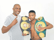 Mzuvukile Magwaca, seen here with his former manager Mla Tengimfene, will start afresh this evening when he vies for the WBF bantamweight title after getting stripped of his previous belts. 