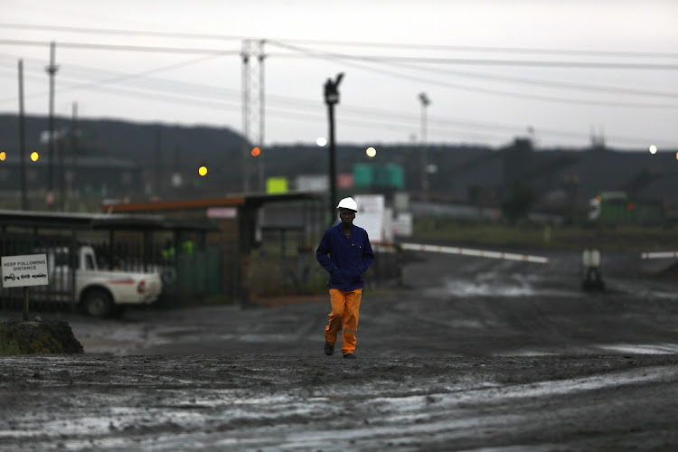 A worker leaves a colliery near Middleburg in Mpumalanga in this March 7 2014 file photo: Picture: KEVIN SUTHERLAND