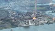 A view of a plant of Azovstal Iron and Steel Works damaged during showers of brightly-burning munitions, amid Russia's invasion of Ukraine, in Mariupol, Ukraine, in this undated still image obtained from a handout video released on May 15, 2022.      VIDEO OBTAINED BY REUTERS/Handout via REUTERS    ATTENTION EDITORS - THIS IMAGE HAS BEEN SUPPLIED BY A THIRD PARTY.  REUTERS IS UNABLE TO INDEPENDENTLY VERIFY THE AUTHENTICITY, CONTENT OR DATE OF THIS FOOTAGE.